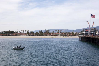 picture of boat next to pier